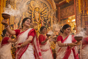 Durga Puja Classic: How to Style a White and Red Saree
