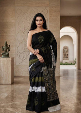 Black geometric and floral motif mulmul cotton saree with green accents, worn by model