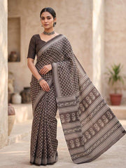 Deep espresso brown handblock print mulmul cotton saree, worn by model