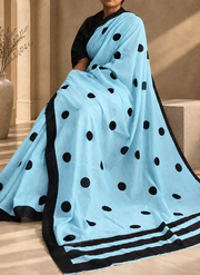 Sky blue cotton mulmul saree with black polka dots and black border