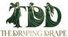 A stylized logo or emblem reading 'TDD' with three draped female figures integrated into the letters, above the words 'THE DRAPING DRAPE' in gold serif text, shown on a transparent checkerboard background.